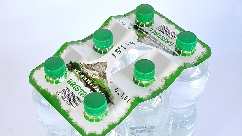 Kartonowe koszyczki z nadrukiem na 6 butelek z wodą