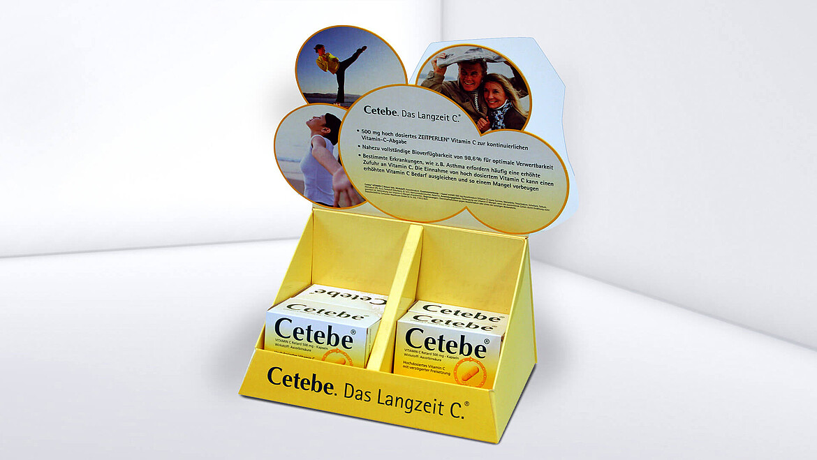 Zadrukowany stojak z dwiema przegródkami na kartoniki z produktem